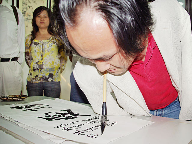 入選獎《無臂書法家》 上海 夏冠南.jpg